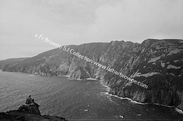 SLIEVE LEAGUE FROM BUNGLASS WITH MRS BYRNE IN FOREGROUND